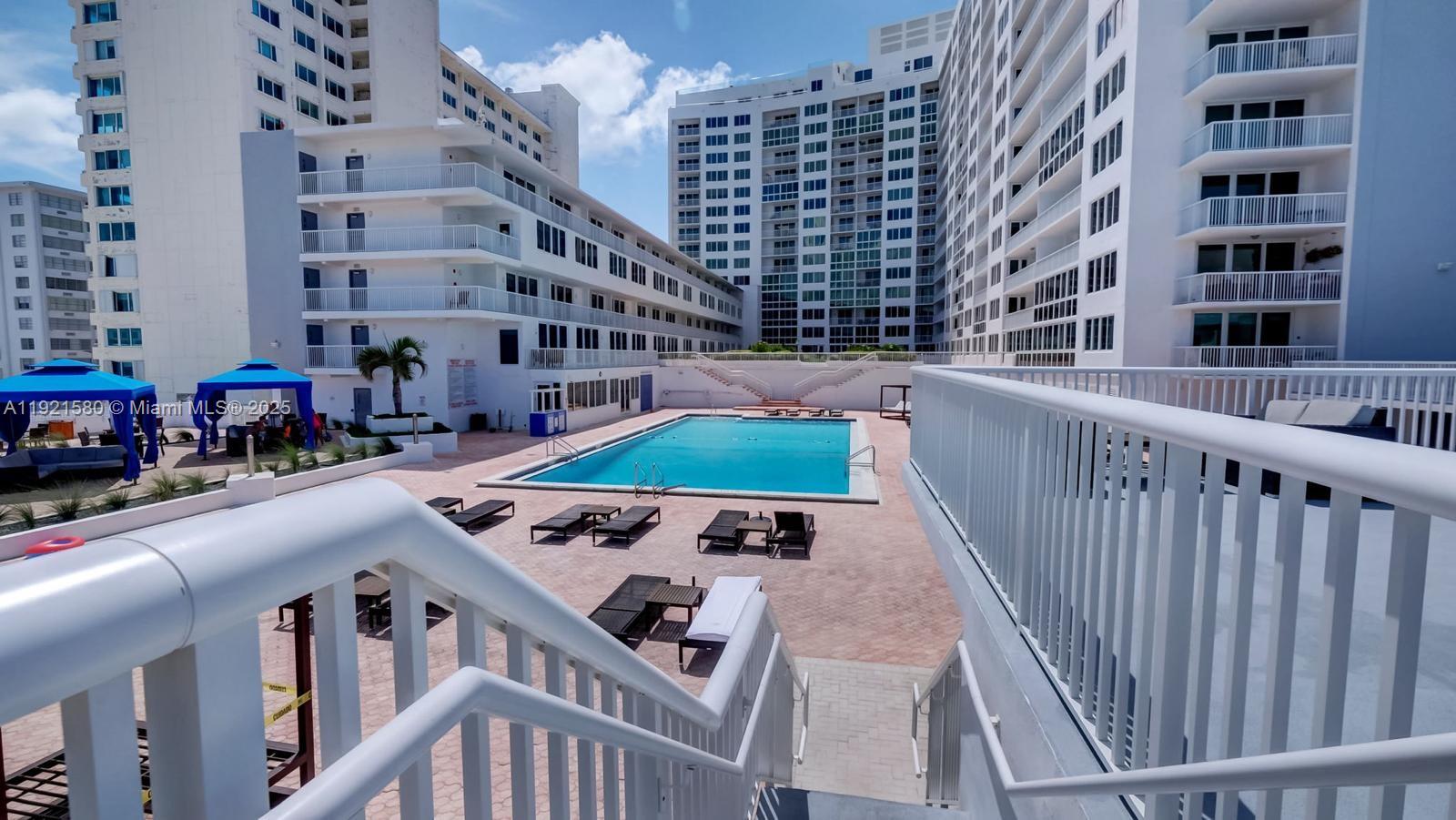 5401 Collins Avenue, Unit 340 Miami Beach, FL 33140 - Photo 25 of 54 a view of building with balcony