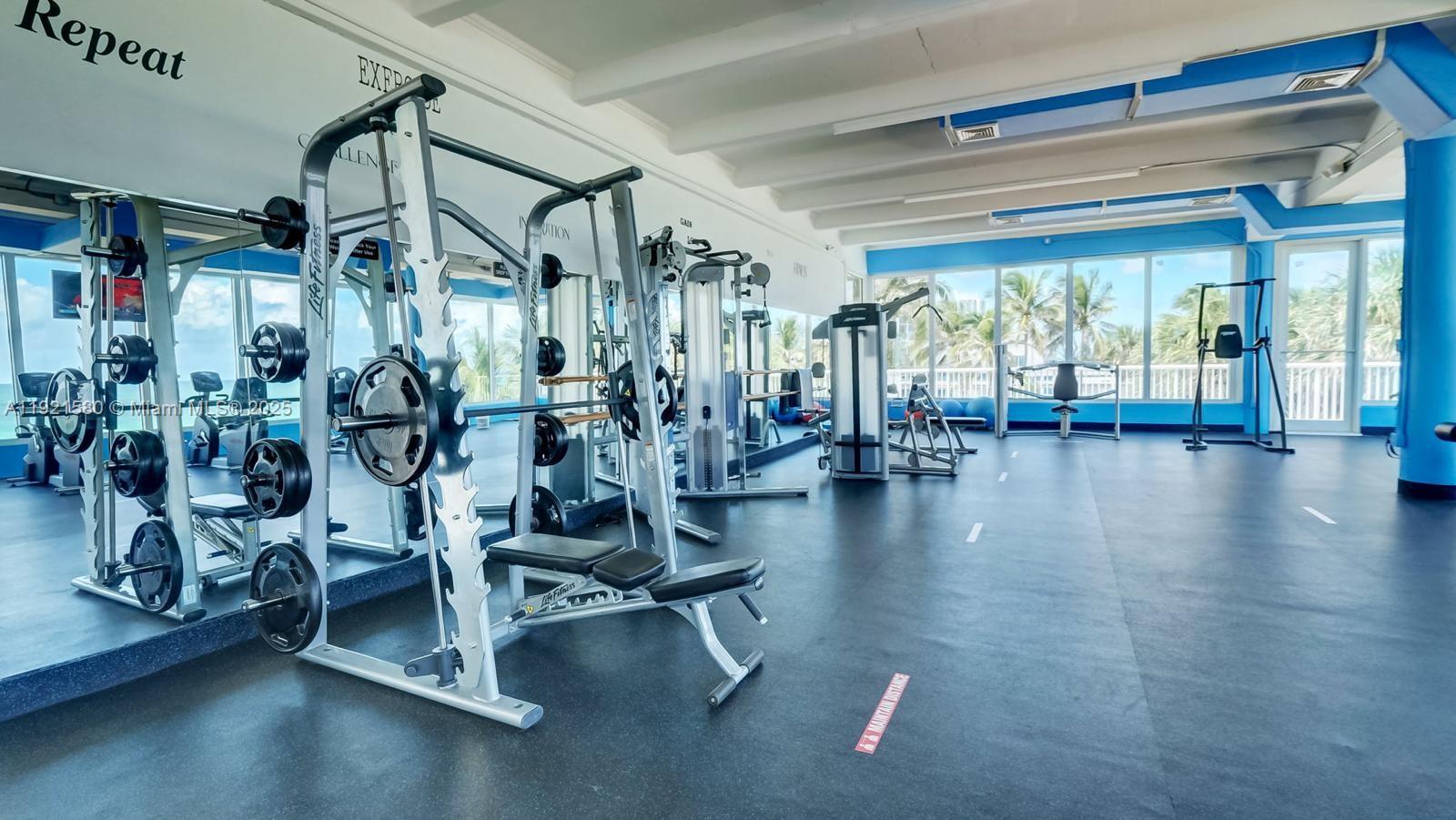 5401 Collins Avenue, Unit 340 Miami Beach, FL 33140 - Photo 28 of 54 a view of a room with gym equipment