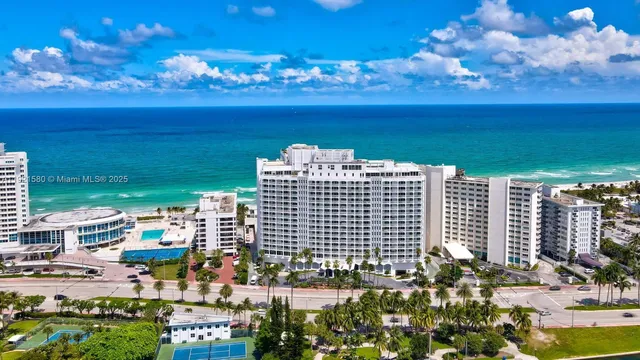 a view of a city with tall buildings