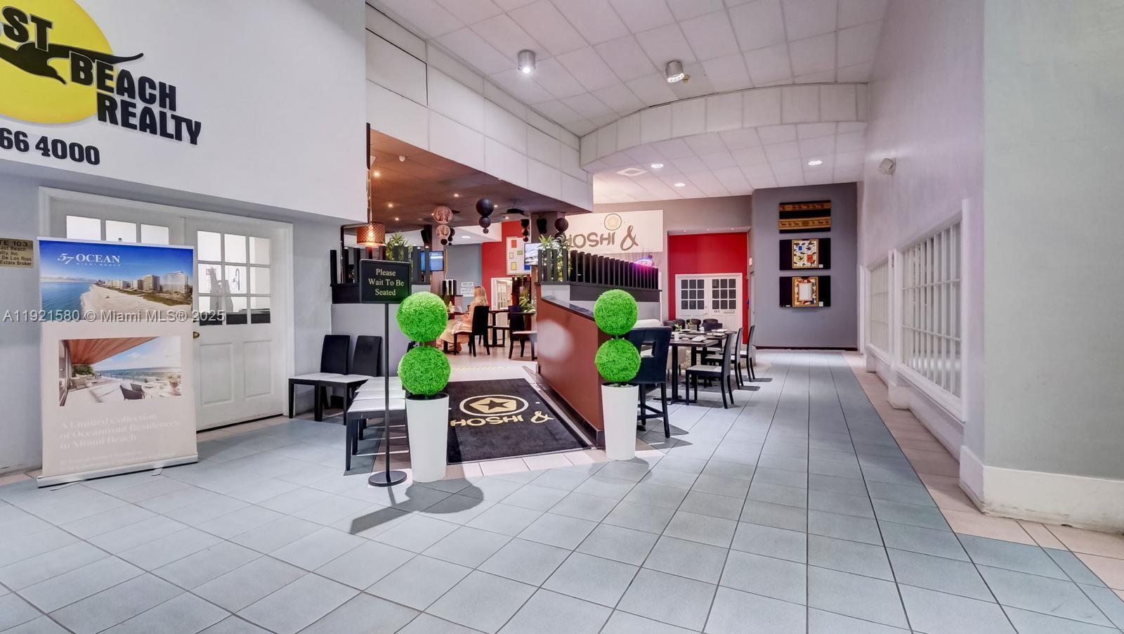 5401 Collins Avenue, Unit 340 Miami Beach, FL 33140 - Photo 33 of 54 a view of a room with gym equipment