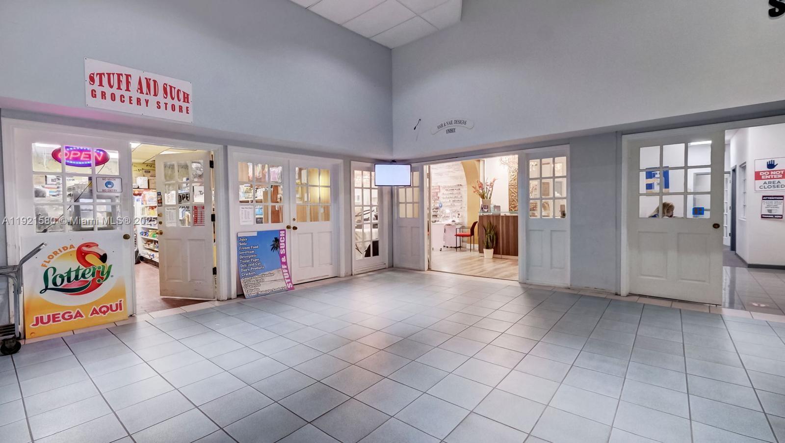 5401 Collins Avenue, Unit 340 Miami Beach, FL 33140 - Photo 34 of 54 a view of an entryway with hallway closet and chandelier