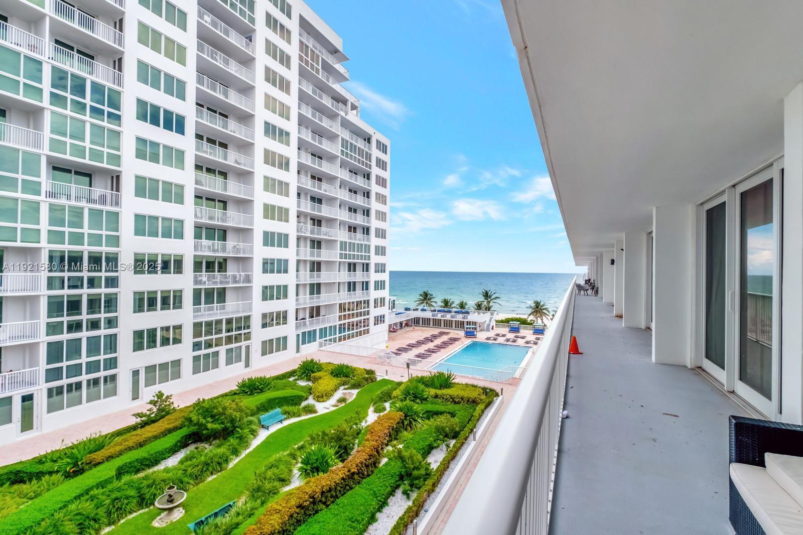 5401 Collins Avenue, Unit 340 Miami Beach, FL 33140 - Photo 36 of 54 a view of a balcony with many windows