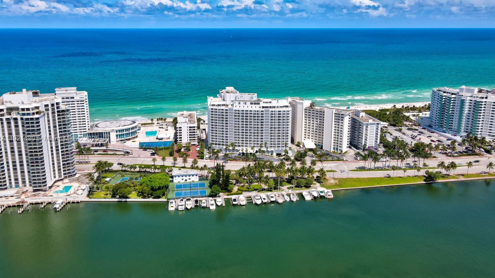5401 Collins Avenue, Unit 340 Miami Beach, FL 33140 - Photo 4 of 54 a view of swimming pool with outdoor space and seating area