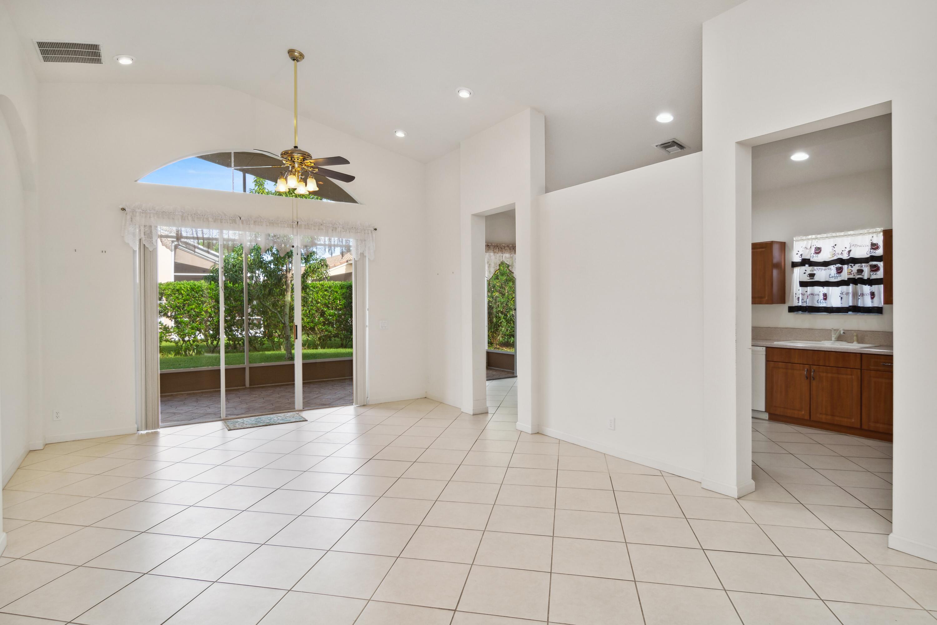 403 Springview Loop Port St. Lucie, FL 34986 - Photo 3 of 52 03_403NWSpringviewLoop_1_LivingRoom_HiRe
