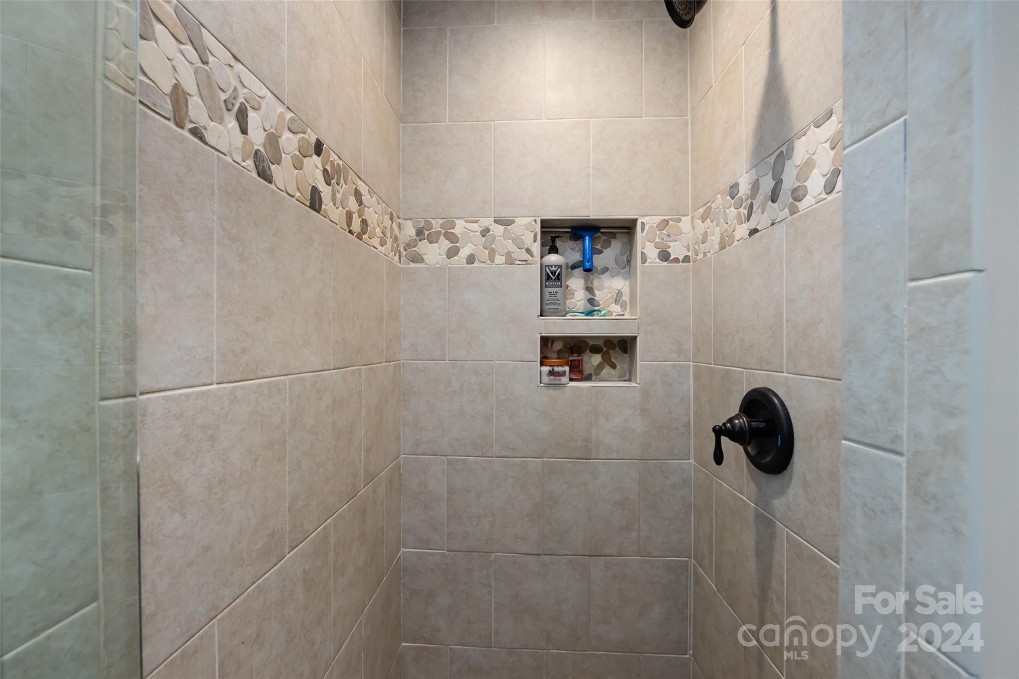 439 Boyce Road Charlotte, NC 28211 - Photo 20 of 47 a bathroom with a shower