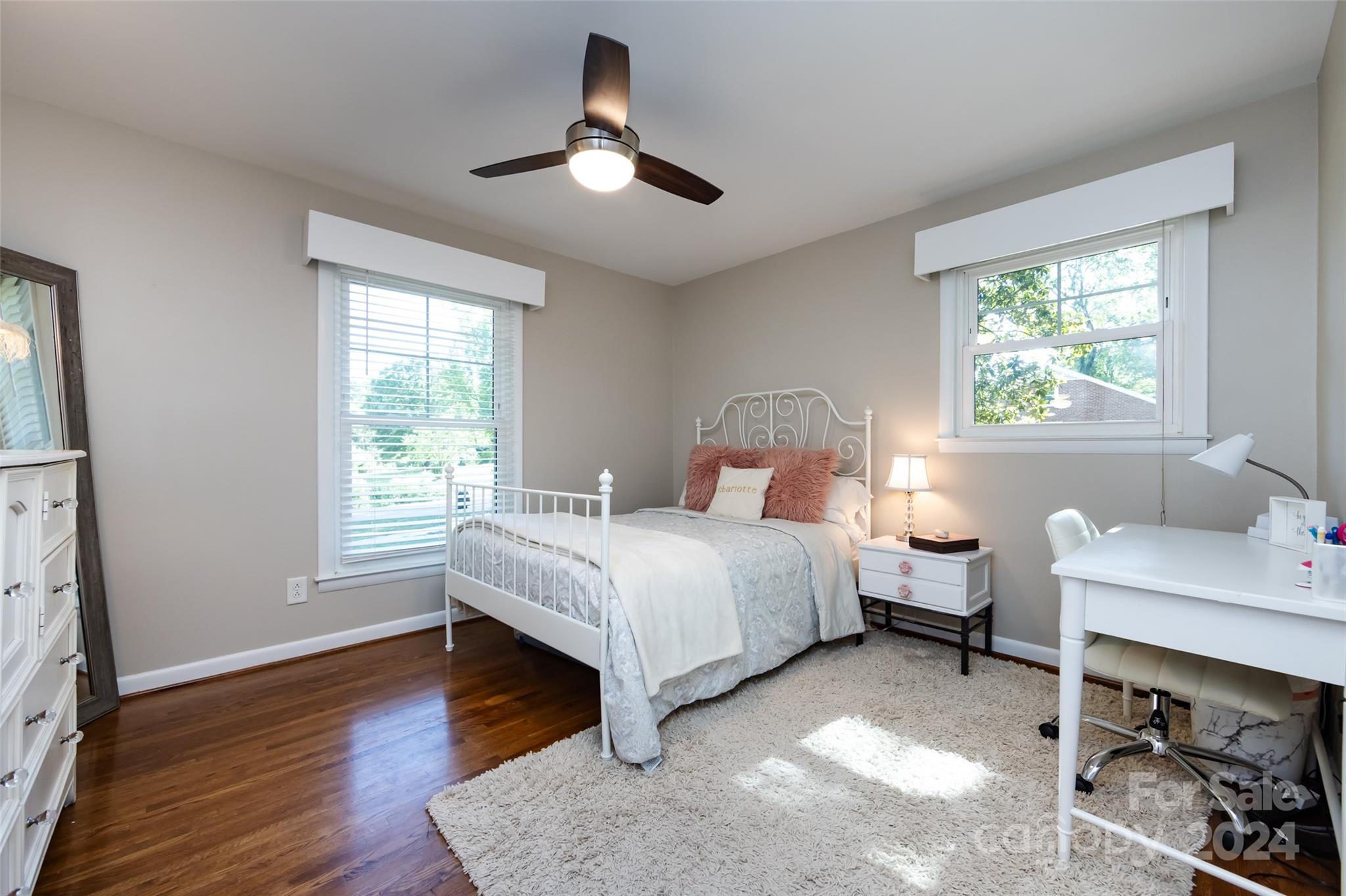 439 Boyce Road Charlotte, NC 28211 - Photo 24 of 47 a bedroom with a bed furniture and a window