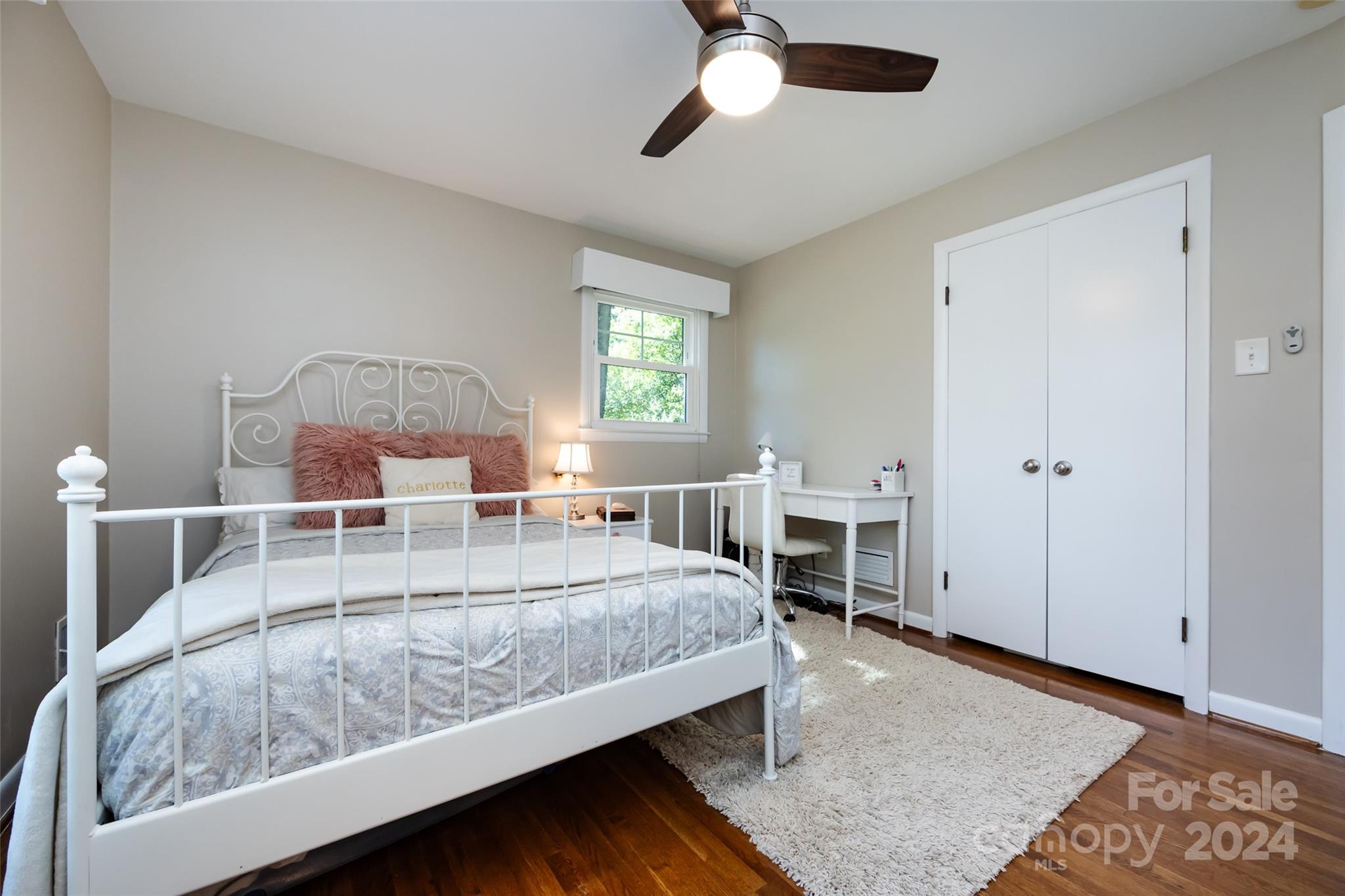 439 Boyce Road Charlotte, NC 28211 - Photo 25 of 47 a bed room with a bed and a window