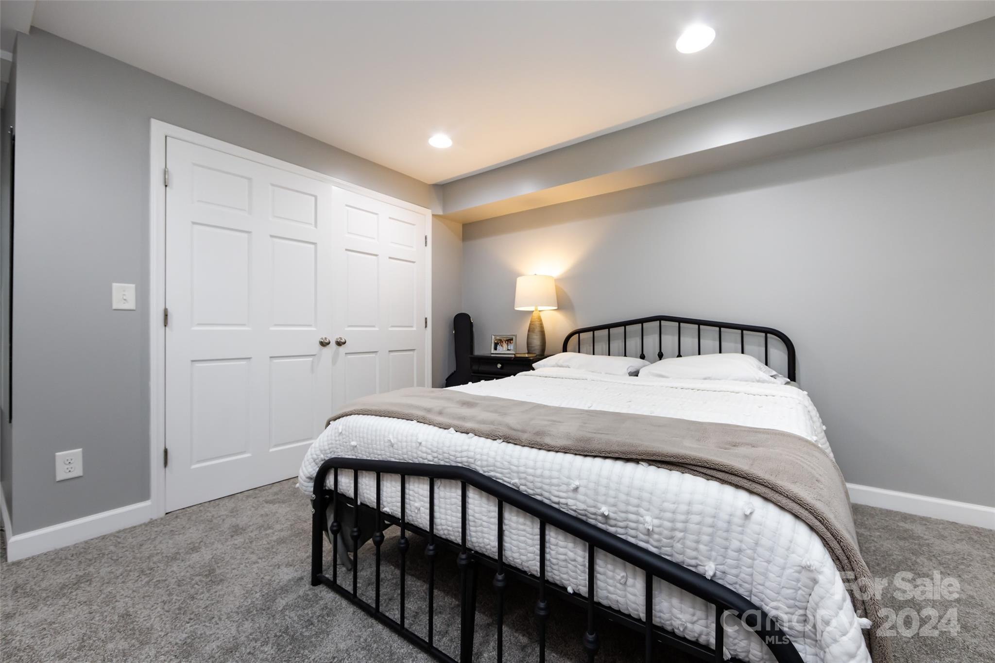 439 Boyce Road Charlotte, NC 28211 - Photo 30 of 47 a bedroom with a bed and a window