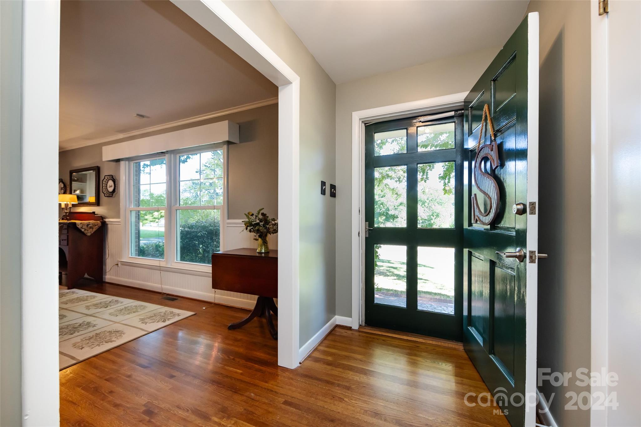 439 Boyce Road Charlotte, NC 28211 - Photo 3 of 47 a view of an entryway and wooden floor