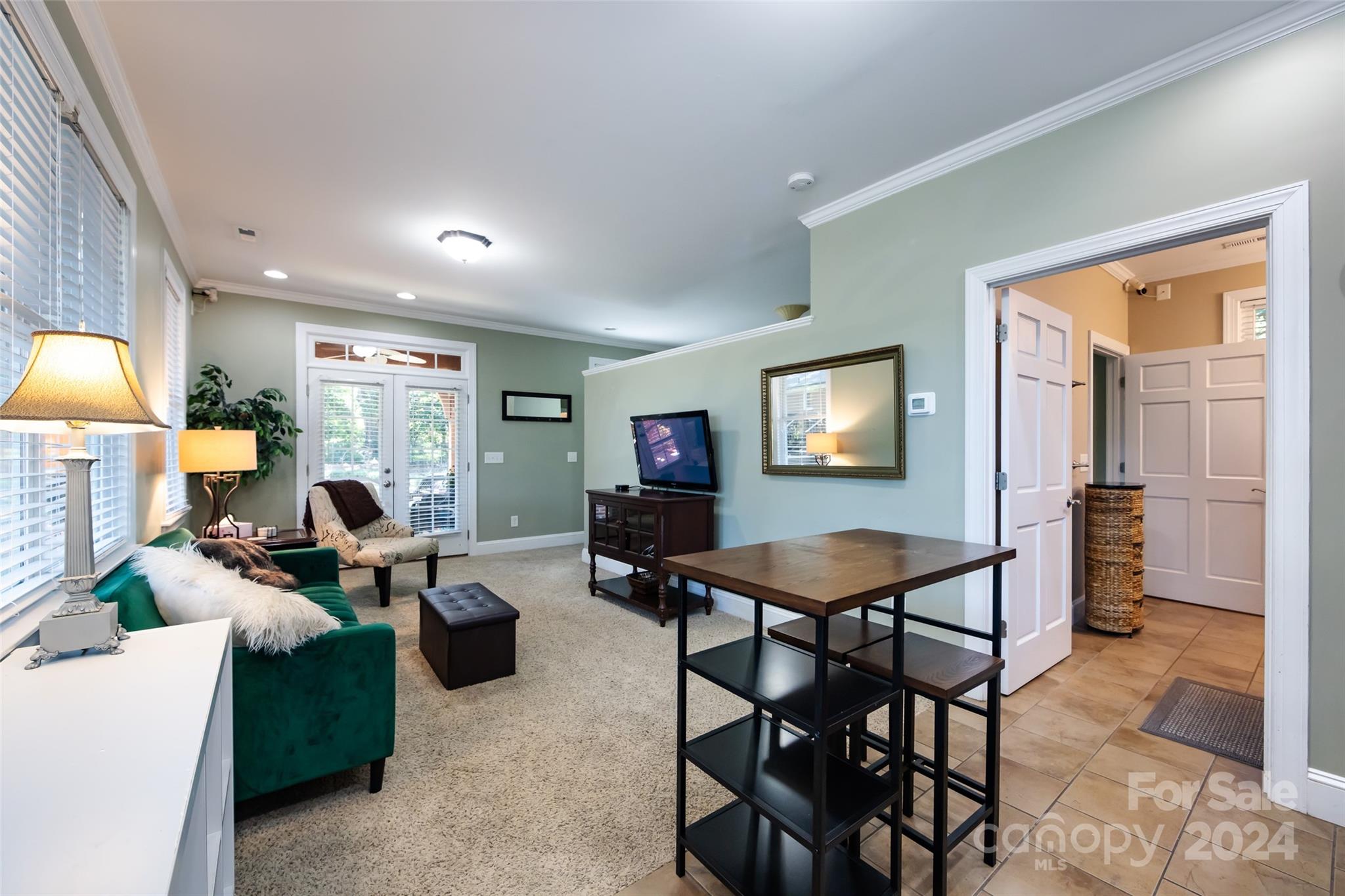 439 Boyce Road Charlotte, NC 28211 - Photo 36 of 47 a living room with furniture and a wooden floor