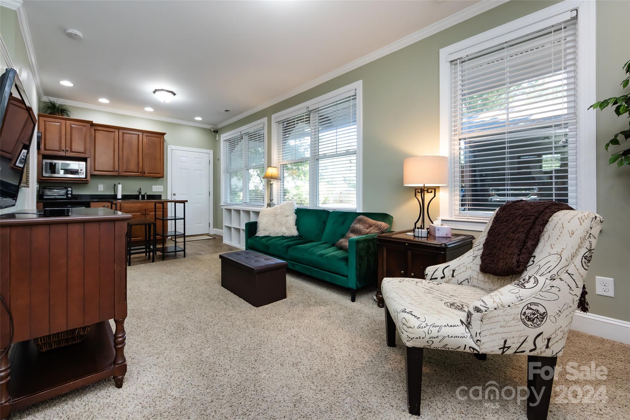 439 Boyce Road Charlotte, NC 28211 - Photo 38 of 47 a living room with furniture wooden floor and a window