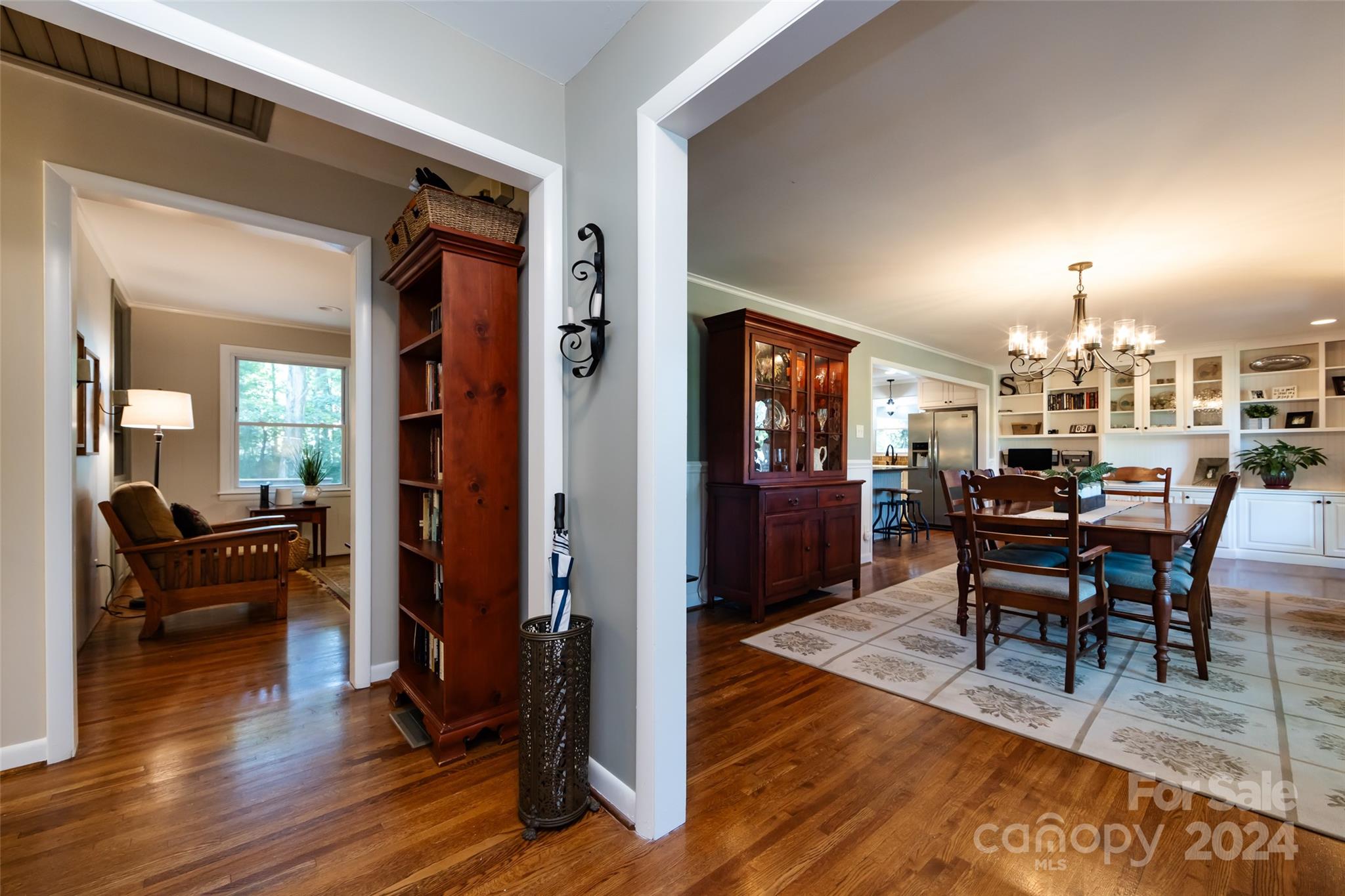 439 Boyce Road Charlotte, NC 28211 - Photo 4 of 47 a view of a dining room with furniture and wooden floor