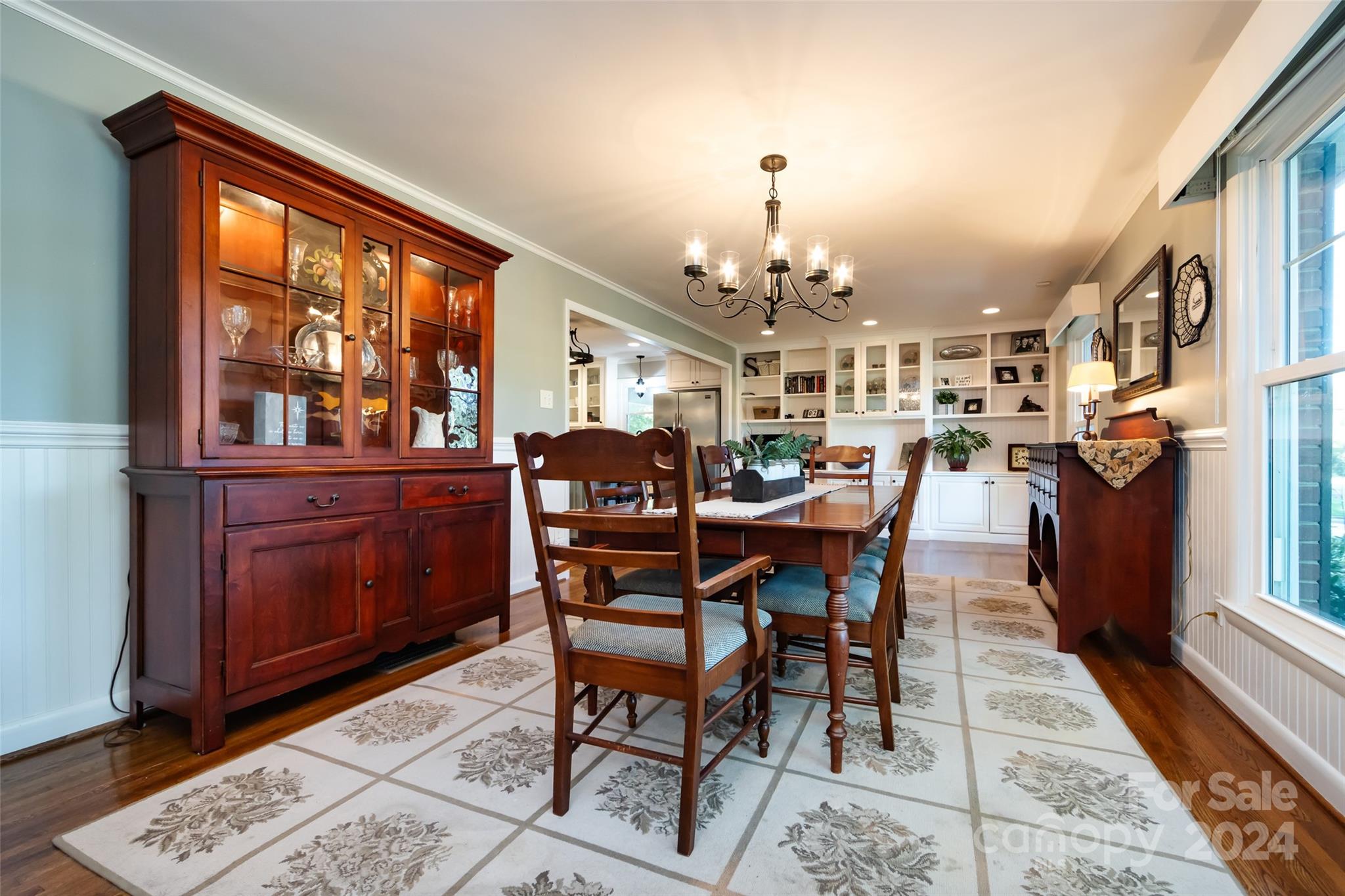 439 Boyce Road Charlotte, NC 28211 - Photo 6 of 47 a dining room with furniture and wooden floor