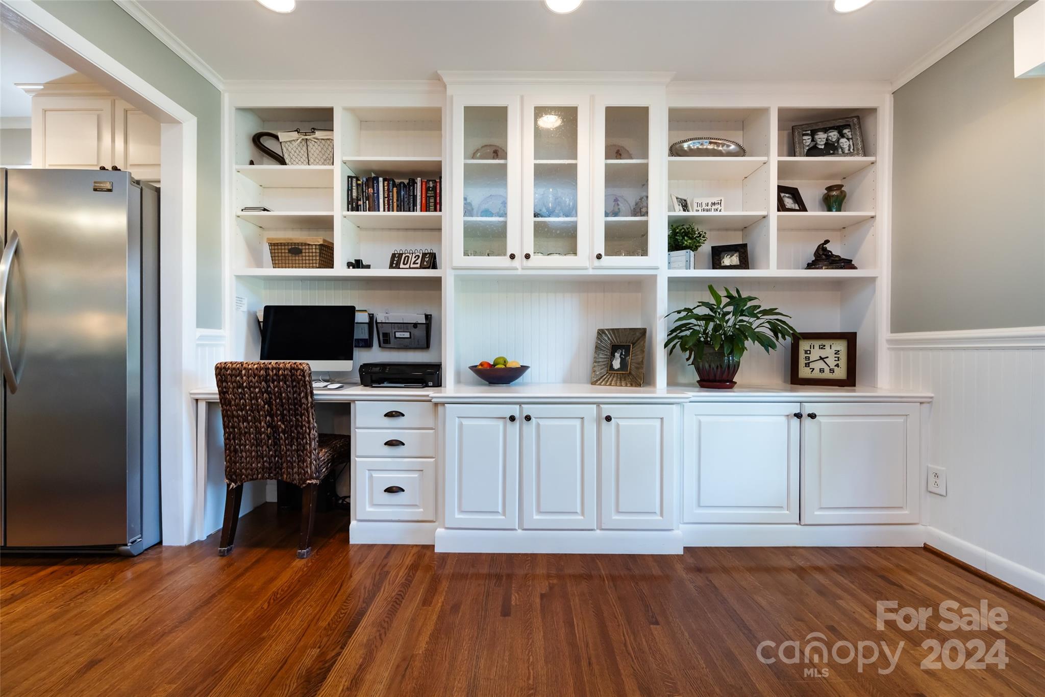 439 Boyce Road Charlotte, NC 28211 - Photo 7 of 47 a kitchen with stainless steel appliances a refrigerator and a hard wood floor