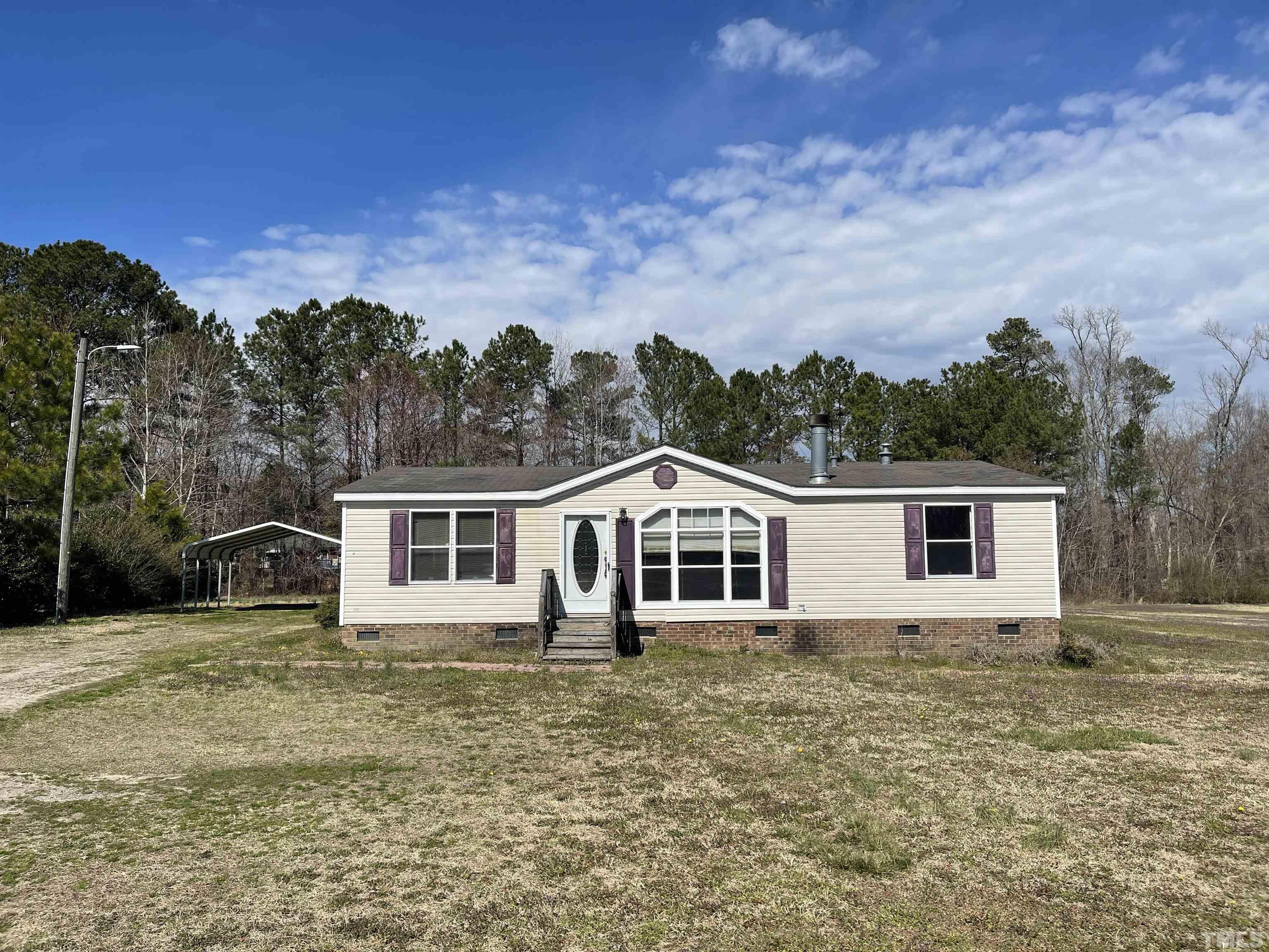 45 Beaver Run Road Spring Hope, NC 27882 - Photo 1 of 19 front view of a house with a yard