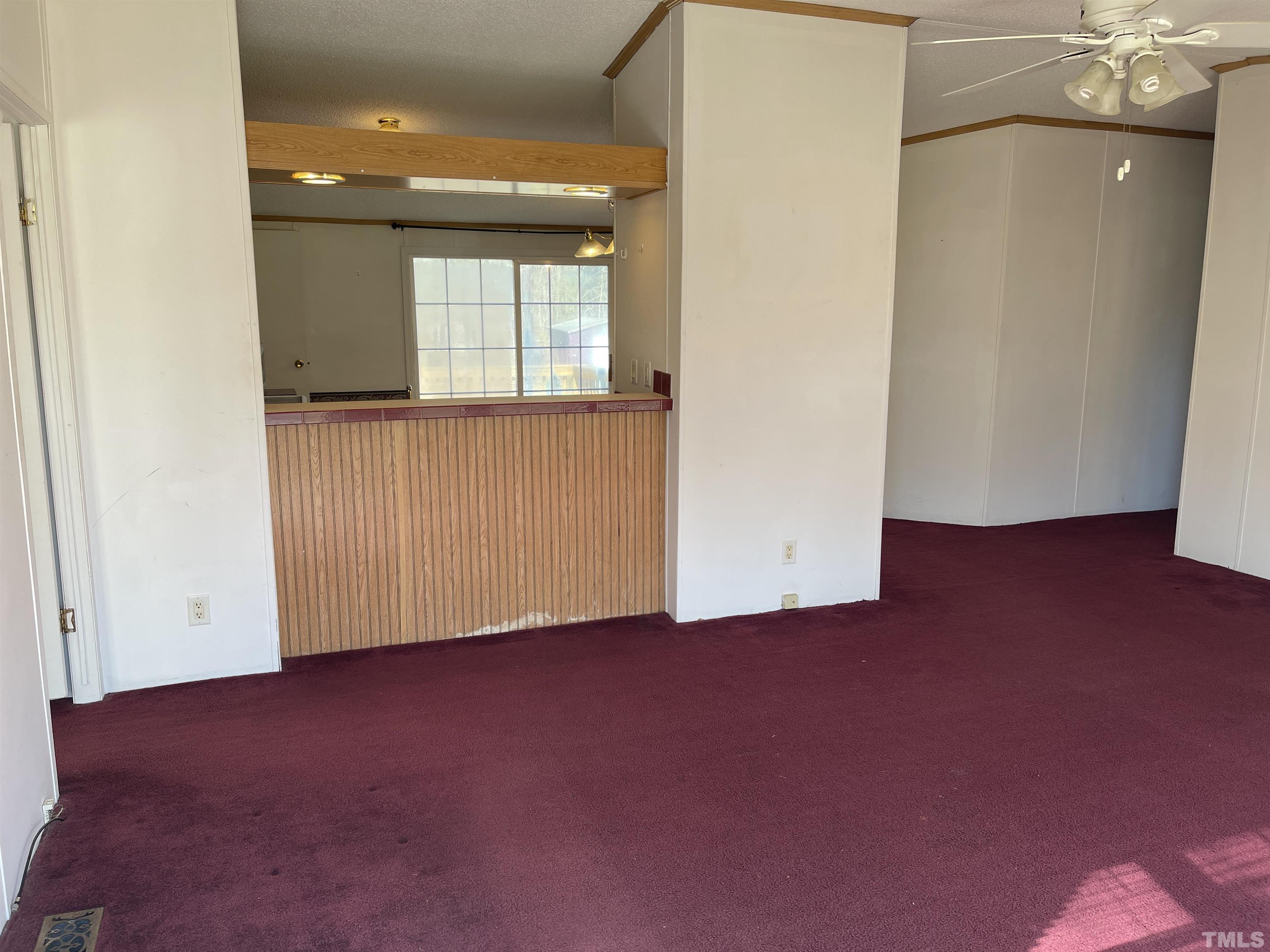 45 Beaver Run Road Spring Hope, NC 27882 - Photo 4 of 19 an empty room with windows