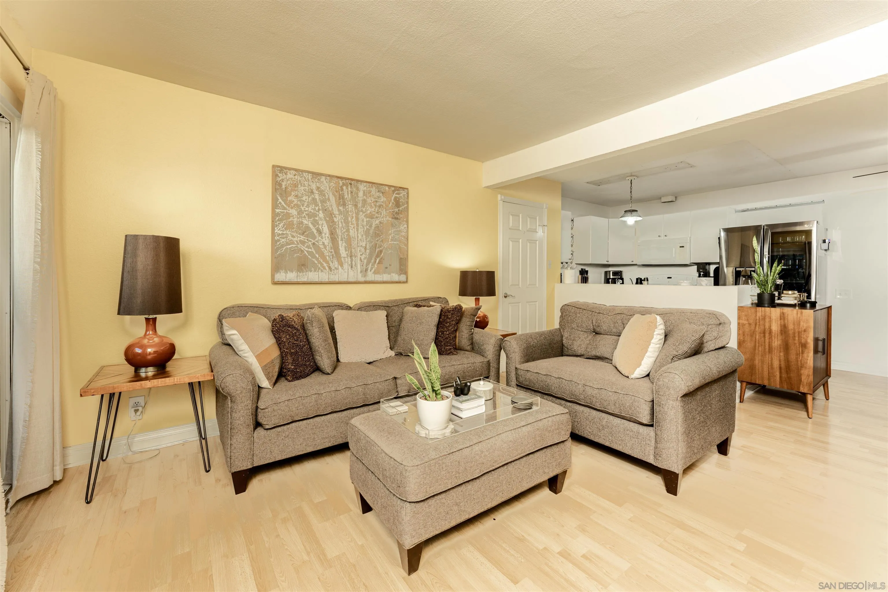 a view of a livingroom with furniture and a couch