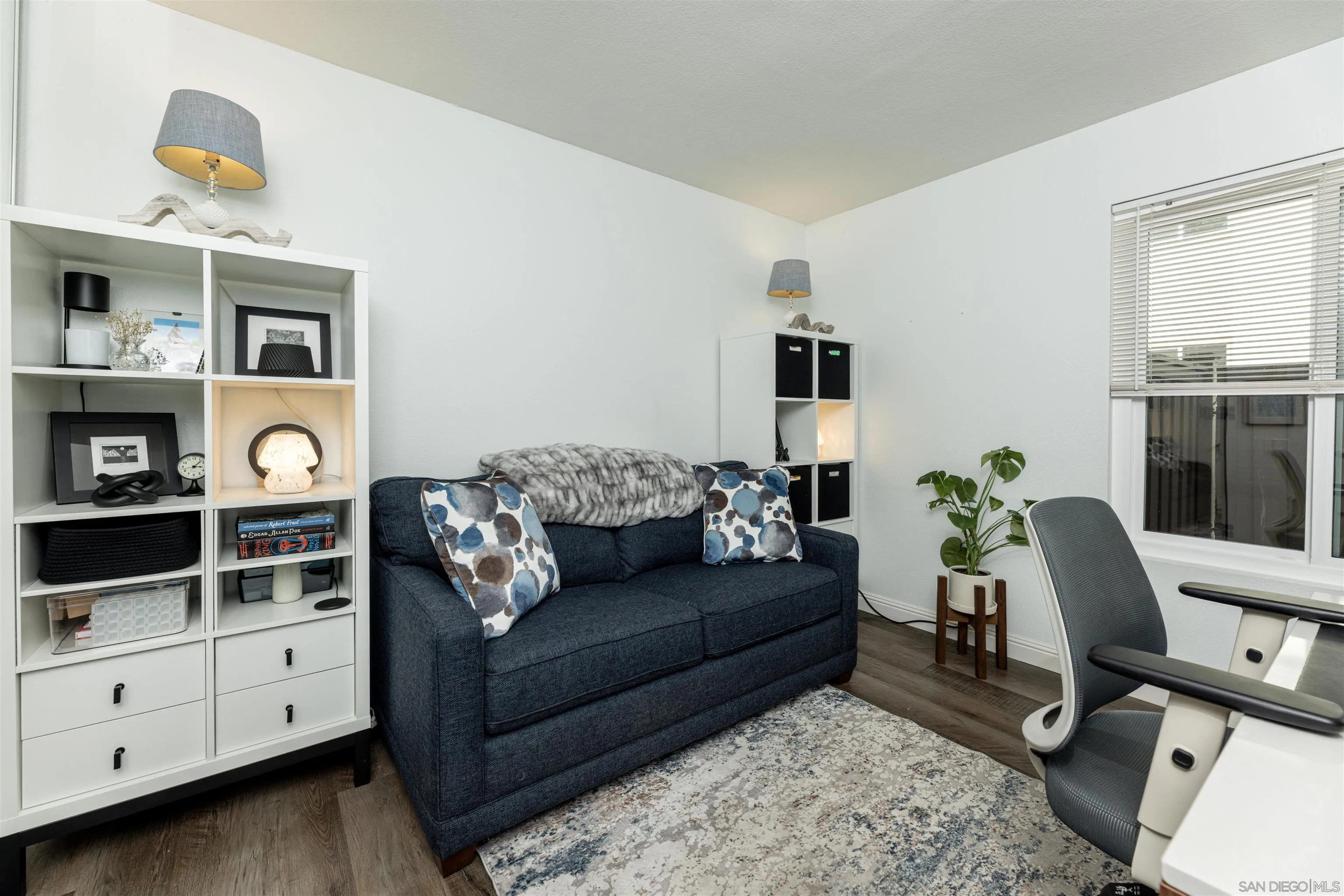 3550 Ruffin Road, Unit 155 San Diego, CA 92123 - Photo 19 of 25 a living room with furniture and a window