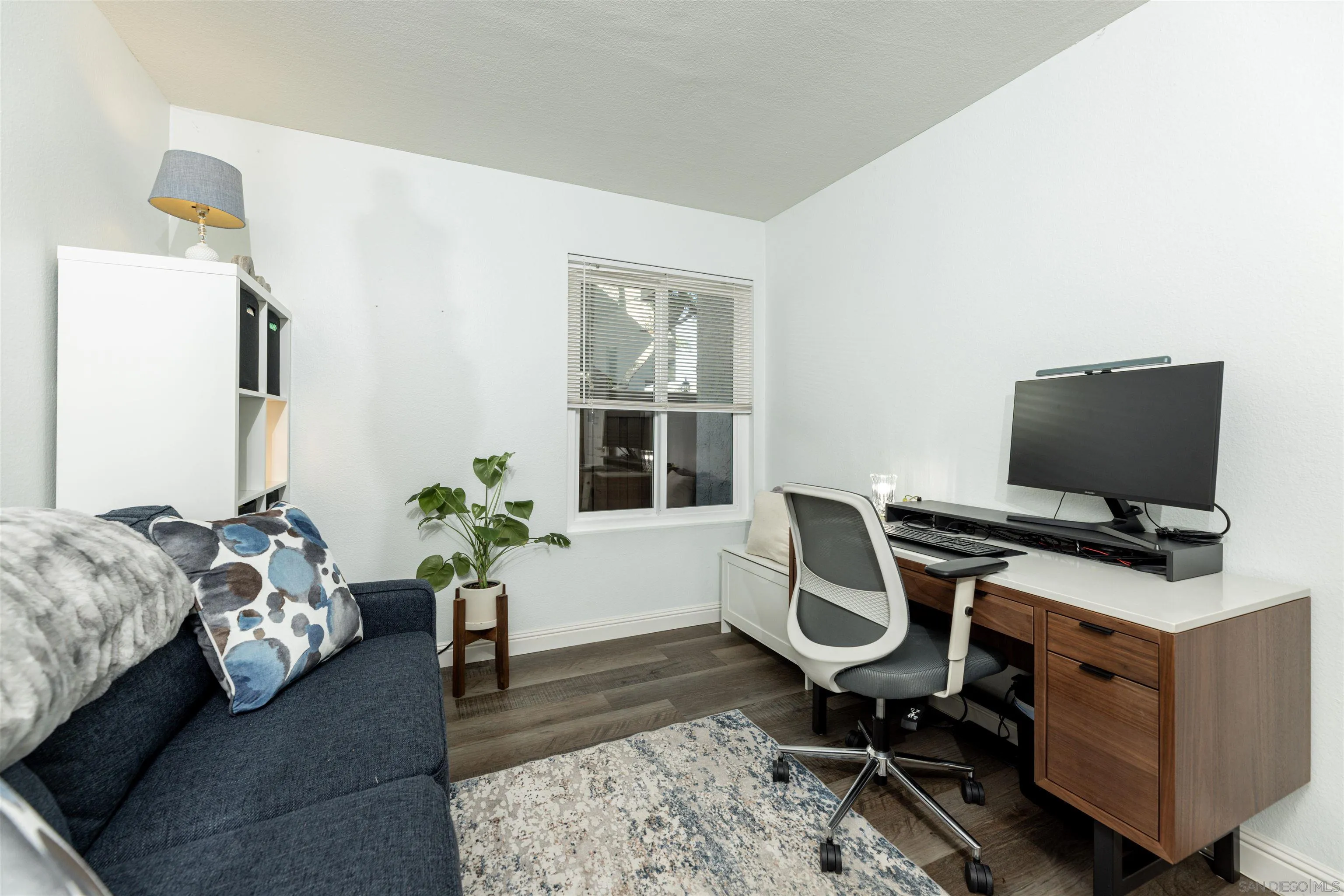 3550 Ruffin Road, Unit 155 San Diego, CA 92123 - Photo 20 of 25 a view of a workspace with furniture and a window