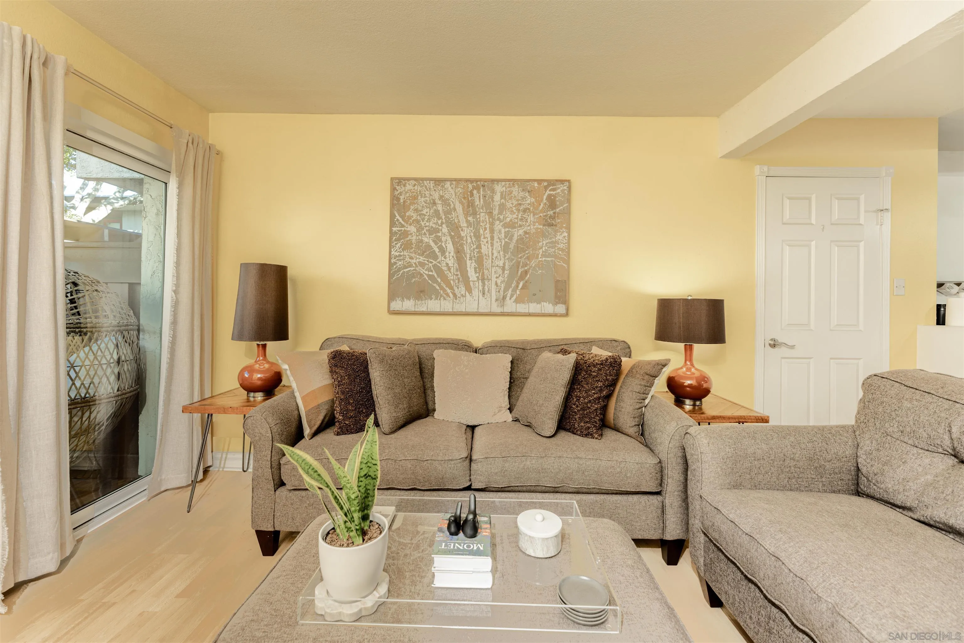 3550 Ruffin Road, Unit 155 San Diego, CA 92123 - Photo 3 of 25 a living room with furniture and a couch