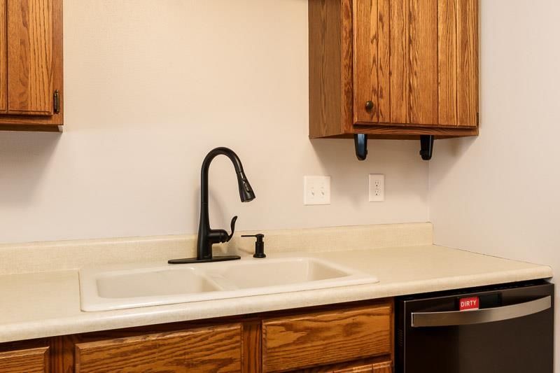 10077 Jesters Row Roscoe, IL 61073 - Photo 15 of 61 a close view of a sink and a window in a kitchen