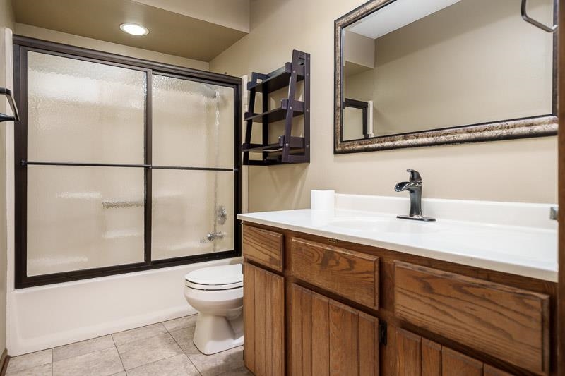 10077 Jesters Row Roscoe, IL 61073 - Photo 28 of 61 a bathroom with a sink toilet and shower