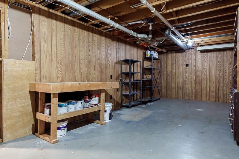 10077 Jesters Row Roscoe, IL 61073 - Photo 34 of 61 a storage room with furniture
