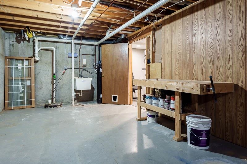 10077 Jesters Row Roscoe, IL 61073 - Photo 35 of 61 a view of an empty room with furniture and a window