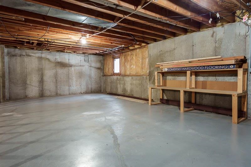 10077 Jesters Row Roscoe, IL 61073 - Photo 41 of 61 a view of an empty room with a garage