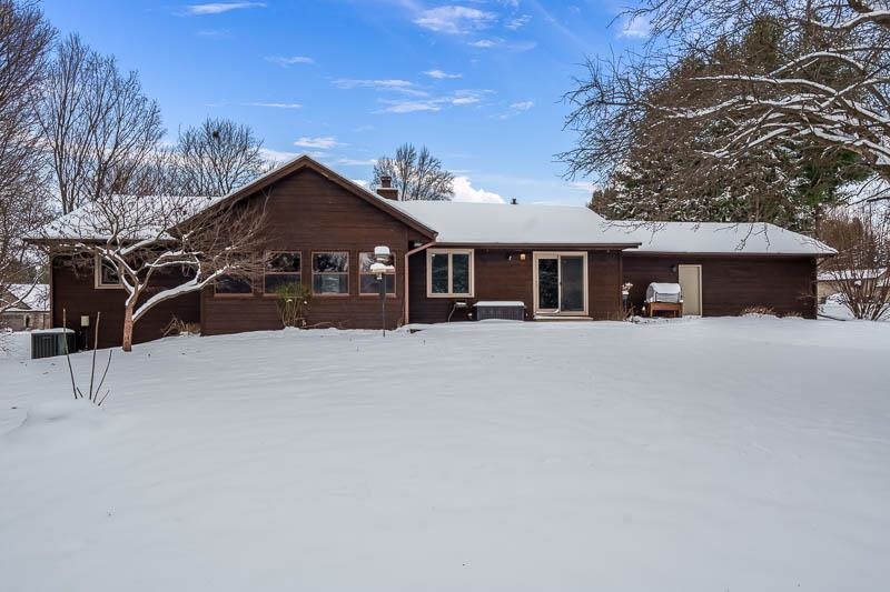 10077 Jesters Row Roscoe, IL 61073 - Photo 42 of 61 a view of house with a yard