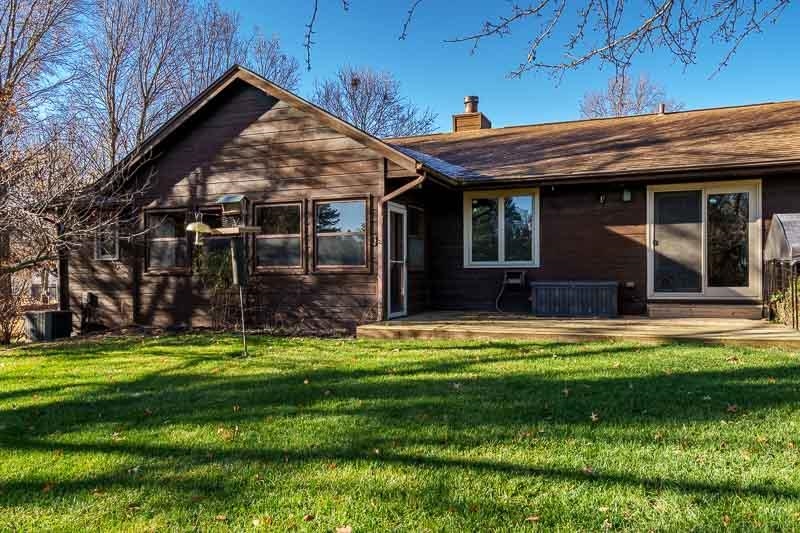 10077 Jesters Row Roscoe, IL 61073 - Photo 51 of 61 a view of a house with swimming pool