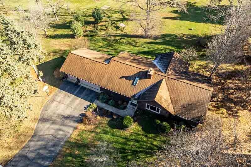 10077 Jesters Row Roscoe, IL 61073 - Photo 54 of 61 a view of a yard with an outdoor space