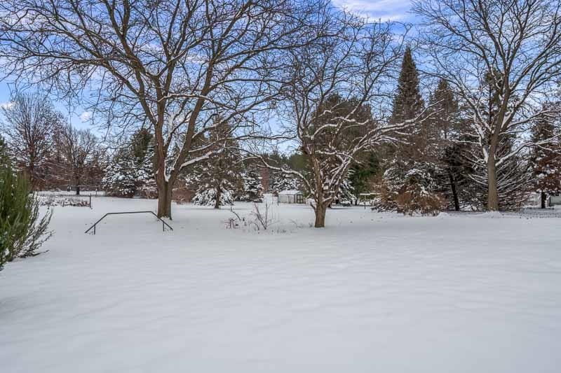 10077 Jesters Row Roscoe, IL 61073 - Photo 60 of 61 a view of a house with a snow in the yard