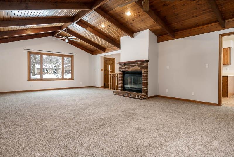 10077 Jesters Row Roscoe, IL 61073 - Photo 9 of 61 a view of empty room with a fireplace