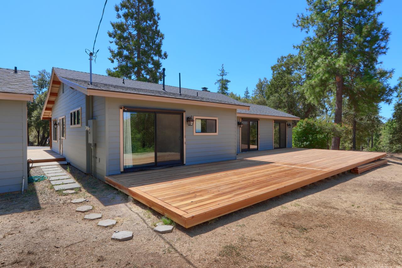 3318 Triangle Road Mariposa, CA 95338 - Photo 33 of 49 a view of a house with a patio