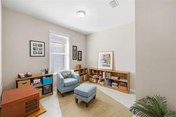 a living room with furniture and a couch