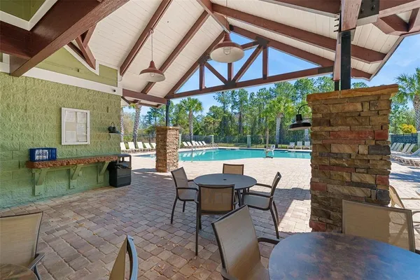 an aerial view of a house with outdoor space