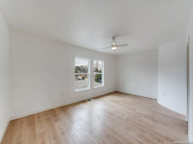 a view of an empty room and window