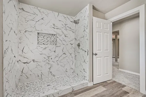 a view of a bathroom with a shower