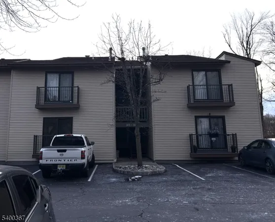a car parked in front of a house