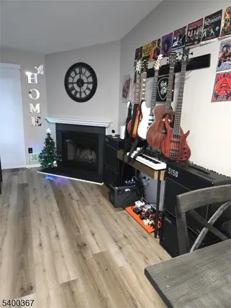 an entryway with wooden floor