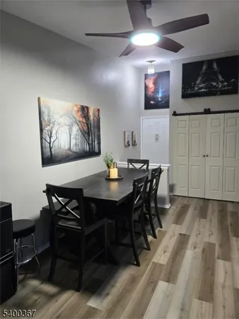 a view of a dining room with furniture