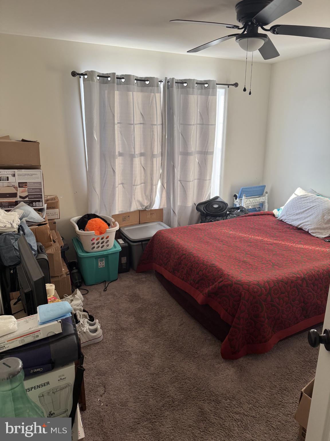 717 Bethayres Street Harrington, DE 19952 - Photo 8 of 11 a bedroom with a bed and a couch