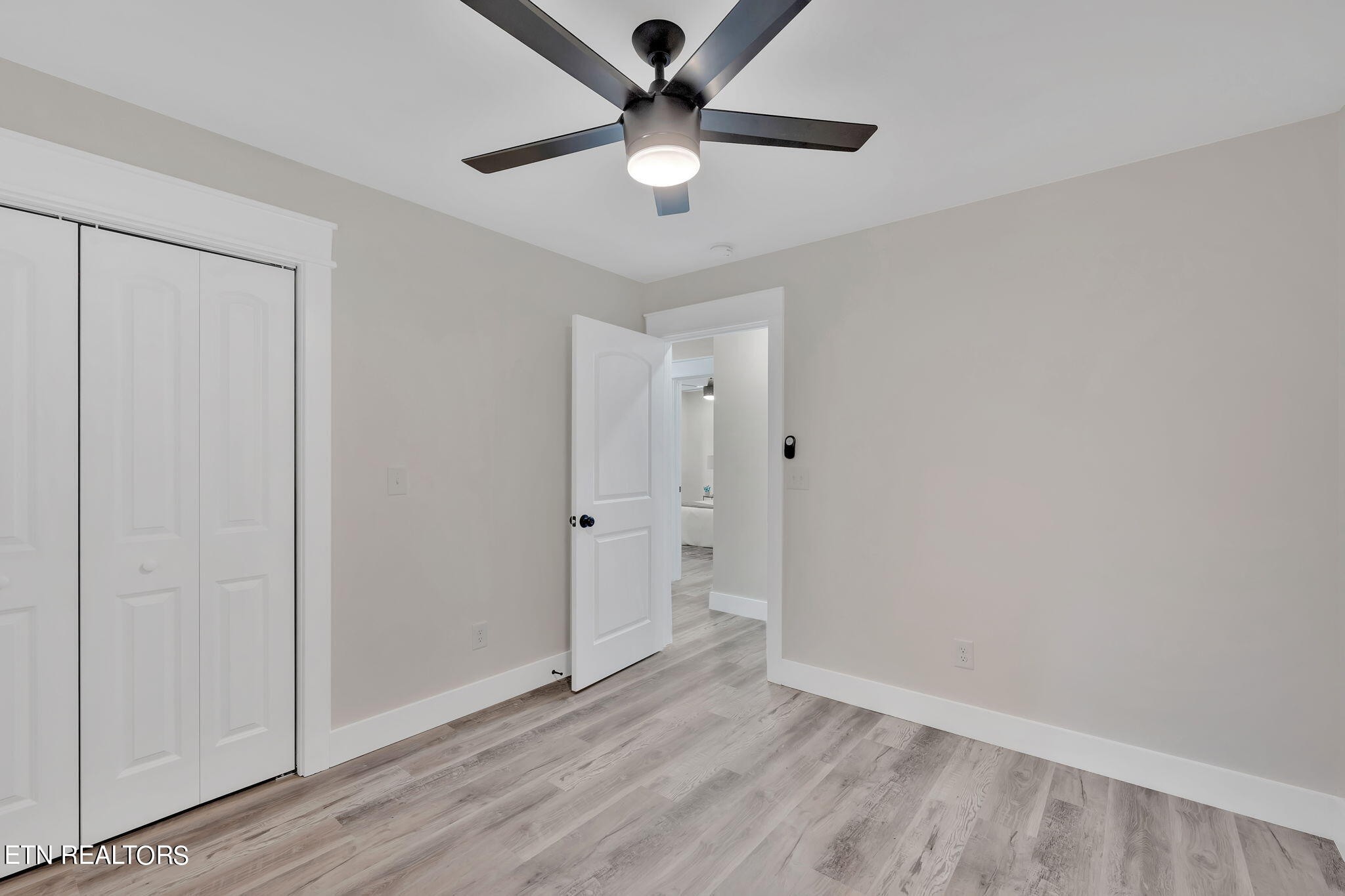 159 Country Way Road Vonore, TN 37885 - Photo 22 of 32 wooden floor in an empty room