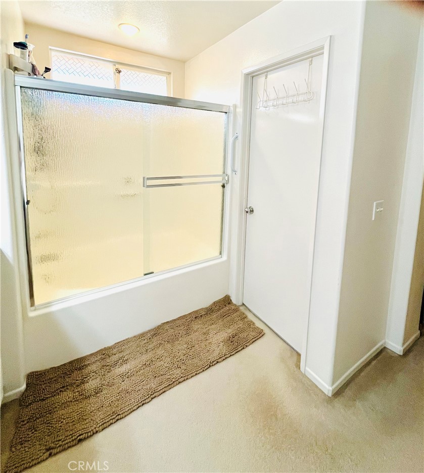 1483 Albillo Loop Perris, CA 92571 - Photo 19 of 46 a view of a small space with a door