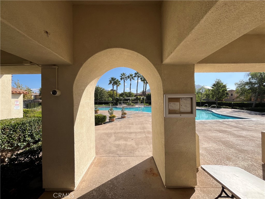 1483 Albillo Loop Perris, CA 92571 - Photo 35 of 46 a view of swimming pool with a outdoor seating