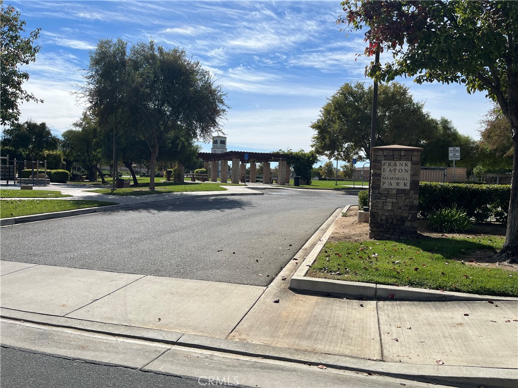 1483 Albillo Loop Perris, CA 92571 - Photo 41 of 46 a view of a street with houses