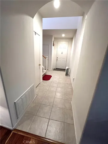 a kitchen with a sink appliances and cabinets