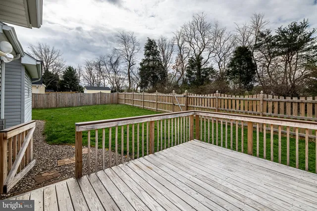 a view of deck with a yard