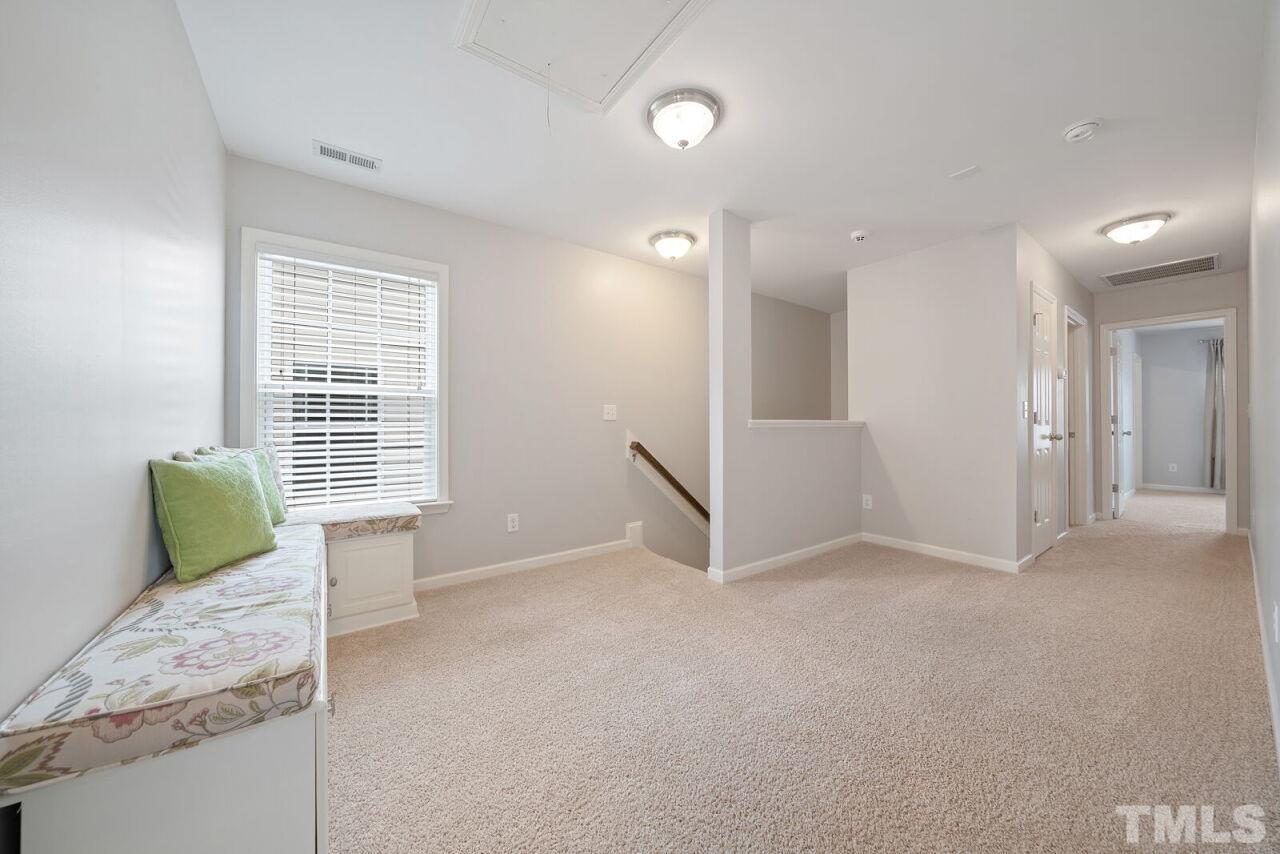 1026 Ileagnes Road Raleigh, NC 27603 - Photo 14 of 29 a view of an empty room with a window